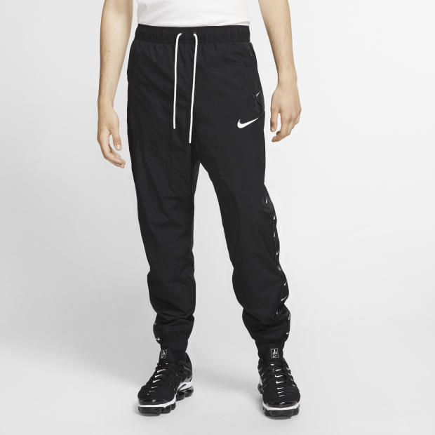 nike woven swoosh pants